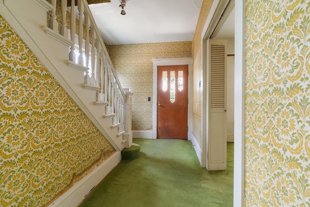 2624 W College Ave, Spokane, WA 99201 - entryway with wallpapered walls, carpet, and stairs