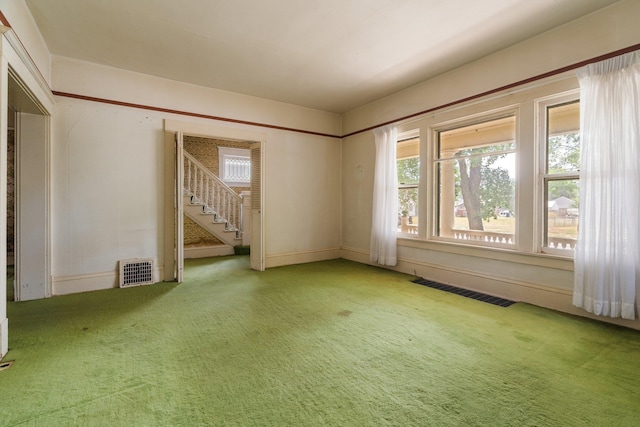 2624 W College Ave, Spokane, WA 99201 - carpeted spare room with stairs and baseboards
