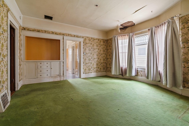 2624 W College Ave, Spokane, WA 99201 - spare room with wallpapered walls and carpet floors