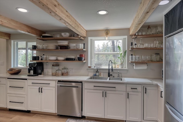 33348 Lakeview Ln, Valley, WA 99181 - kitchen with stainless steel appliances, open shelves, beamed ceiling, white cabinets, and recessed lighting