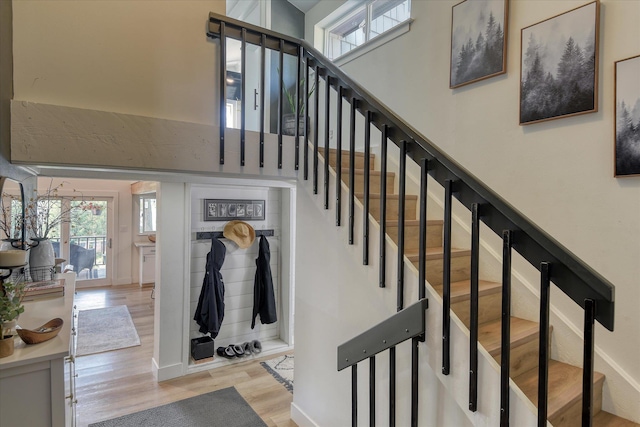33348 Lakeview Ln, Valley, WA 99181 - staircase featuring wood finished floors and a high ceiling