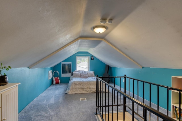 4526 N Walnut St, Spokane, WA 99205 - carpeted bedroom featuring vaulted ceiling