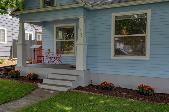 4526 N Walnut St, Spokane, WA 99205 - view of exterior entry featuring a porch and roof with shingles
