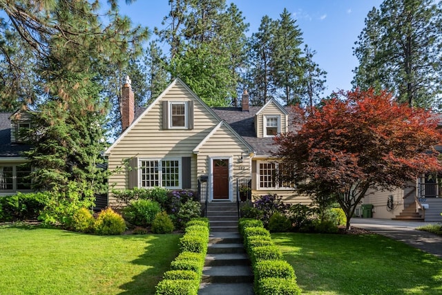 203 W 21st Ave, Spokane, WA 99203 - cape cod house with a front lawn and a chimney