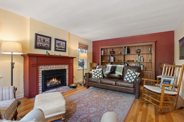 203 W 21st Ave, Spokane, WA 99203 - living room with wood finished floors and a tiled fireplace