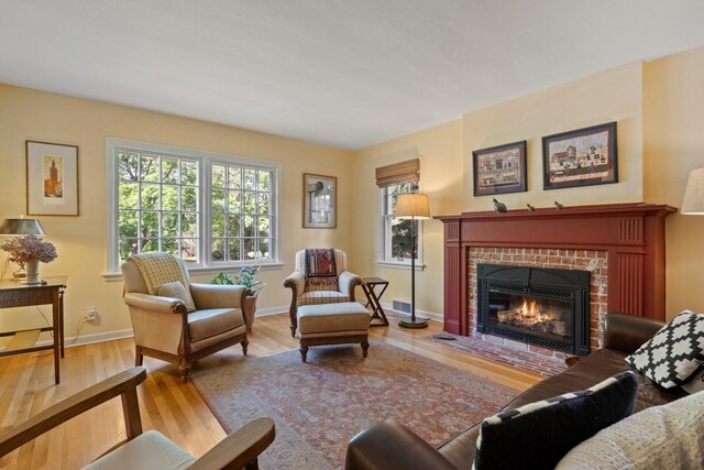 203 W 21st Ave, Spokane, WA 99203 - living area featuring a fireplace and wood finished floors