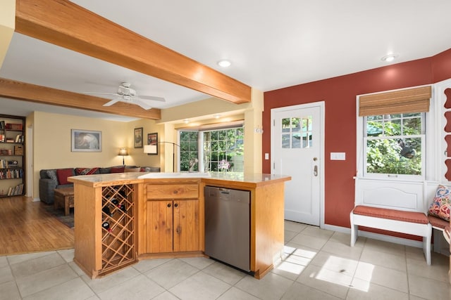 203 W 21st Ave, Spokane, WA 99203 - kitchen featuring stainless steel dishwasher, beam ceiling, open floor plan, ceiling fan, and tile countertops