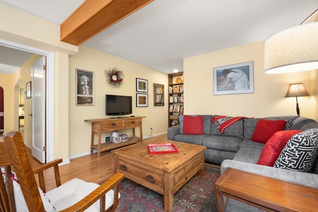 203 W 21st Ave, Spokane, WA 99203 - living room featuring wood finished floors, arched walkways, and recessed lighting