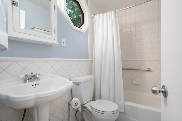 203 W 21st Ave, Spokane, WA 99203 - bathroom with shower / bath combo with shower curtain, wainscoting, and tile walls