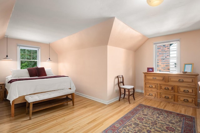 203 W 21st Ave, Spokane, WA 99203 - bedroom with wood finished floors and lofted ceiling