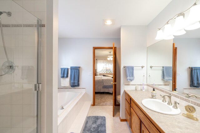 7106 S Moran View St, Spokane, WA 99224 - bathroom with a shower stall, a bath, vanity, ensuite bath, and ceiling fan