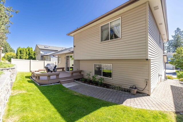 7106 S Moran View St, Spokane, WA 99224 - back of house featuring a deck and a patio area