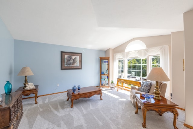 7106 S Moran View St, Spokane, WA 99224 - carpeted living area featuring vaulted ceiling and baseboards