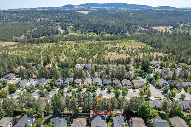 7106 S Moran View St, Spokane, WA 99224 - aerial view of residential area with a heavily wooded area and property parcel outlined