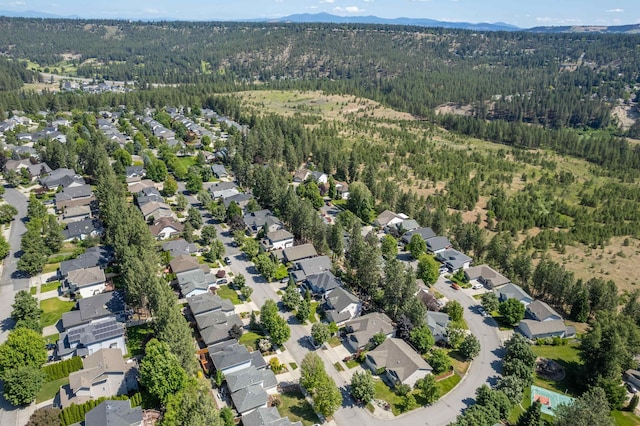7106 S Moran View St, Spokane, WA 99224 - aerial view of property and surrounding area featuring mountains and nearby suburban area