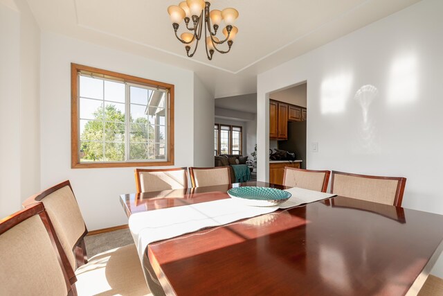5622 E Sheffield, Colbert, WA 99005 - dining area with a chandelier and baseboards