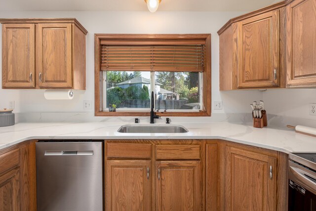 5622 E Sheffield, Colbert, WA 99005 - kitchen featuring dishwasher and brown cabinetry