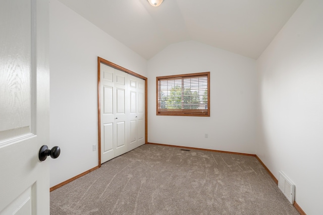 5622 E Sheffield, Colbert, WA 99005 - unfurnished bedroom with carpet flooring, lofted ceiling, and a closet