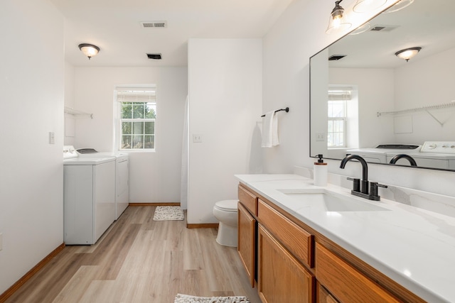 5622 E Sheffield, Colbert, WA 99005 - full bathroom with separate washer and dryer, wood finished floors, and vanity