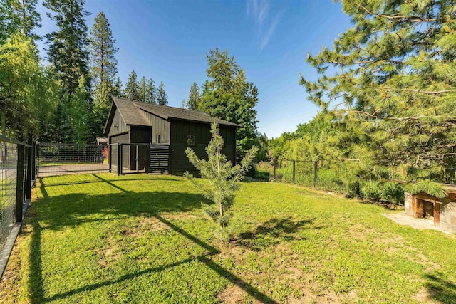 210 3rd St, Dover, ID 83825 - view of yard featuring an outdoor structure
