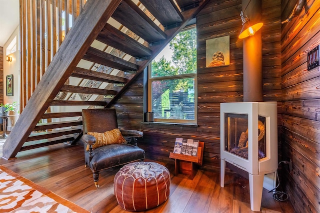 210 3rd St, Dover, ID 83825 - sitting room with hardwood / wood-style flooring and a wood stove