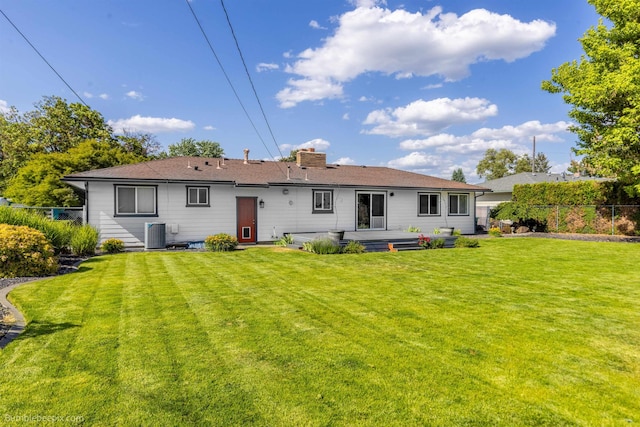 11918 E Grace Ave, Spokane Valley, WA 99206 - back of property with a chimney and a wooden deck