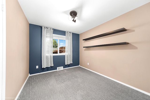 11918 E Grace Ave, Spokane Valley, WA 99206 - spare room with baseboards and carpet flooring