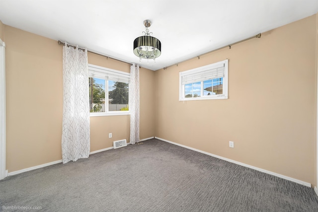 11918 E Grace Ave, Spokane Valley, WA 99206 - empty room featuring carpet floors and baseboards