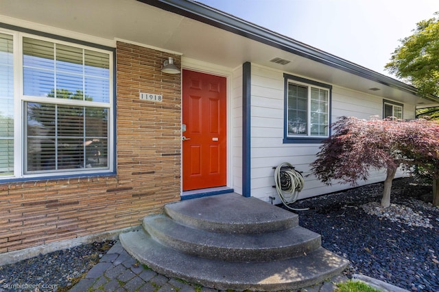 11918 E Grace Ave, Spokane Valley, WA 99206 - property entrance featuring brick siding
