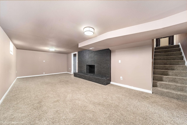 11918 E Grace Ave, Spokane Valley, WA 99206 - unfurnished living room featuring carpet, a fireplace, and stairway