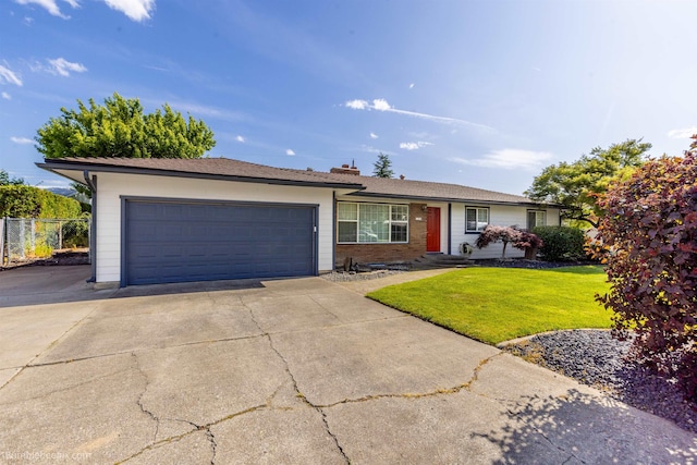 11918 E Grace Ave, Spokane Valley, WA 99206 - ranch-style house featuring an attached garage and concrete driveway