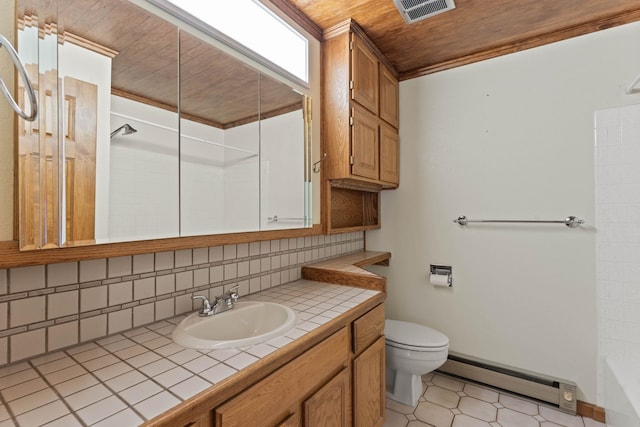 214 W 6th Ave Apt 201, Spokane, WA 99204 - bathroom with a baseboard radiator, wooden ceiling, vanity, and tasteful backsplash