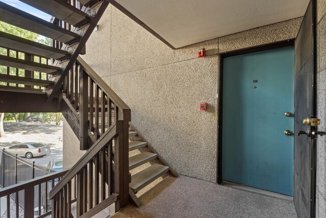 214 W 6th Ave Apt 201, Spokane, WA 99204 - view of exterior entry featuring stucco siding