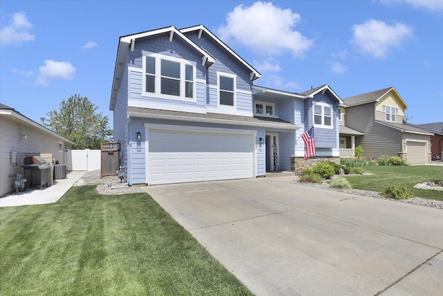 1707 E Vanetta Ave, Spokane, WA 99217 - view of front of house featuring an attached garage, driveway, and a gate