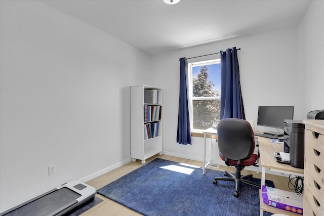 1707 E Vanetta Ave, Spokane, WA 99217 - office with baseboards and wood finished floors
