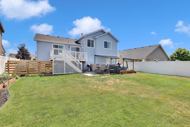 1707 E Vanetta Ave, Spokane, WA 99217 - rear view of house featuring a fenced backyard, a patio, an attached garage, and stairs