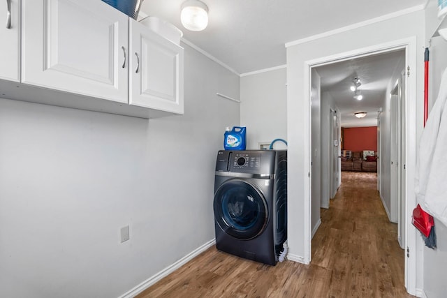 6204 N Oxford Dr, Spokane, WA 99208 - washroom featuring washer / dryer, cabinet space, wood finished floors, and crown molding