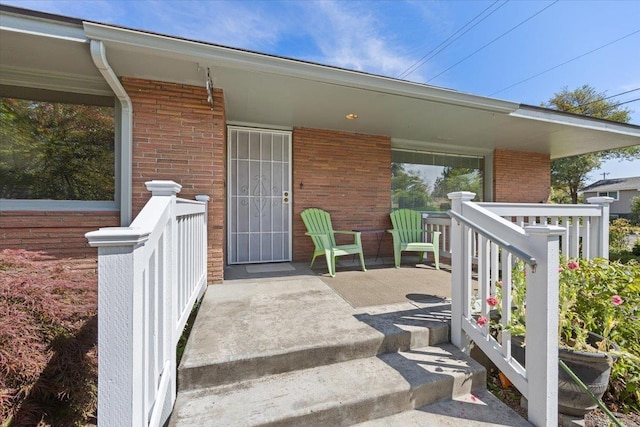 3157 E 35th Ave, Spokane, WA 99223 - view of exterior entry with brick siding and covered porch