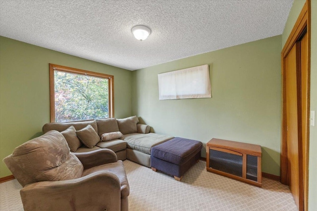 3157 E 35th Ave, Spokane, WA 99223 - living area with light carpet and a textured ceiling
