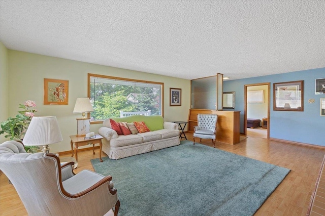 3157 E 35th Ave, Spokane, WA 99223 - living area with wood finished floors and a textured ceiling