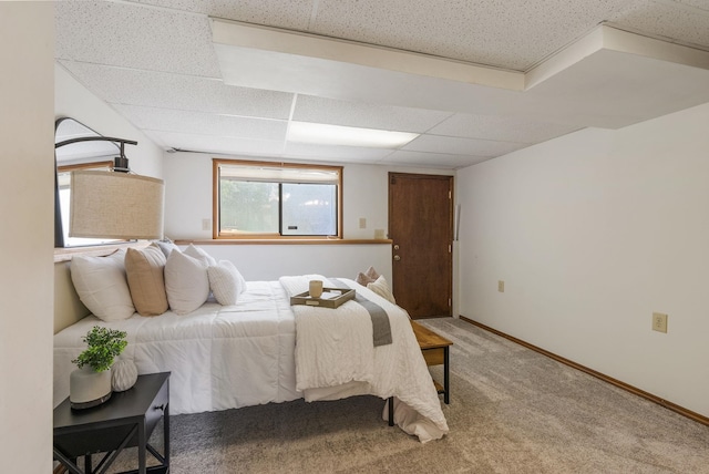 10818 N Humboldt Dr, Spokane, WA 99218 - bedroom featuring light carpet and a paneled ceiling