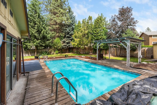 10818 N Humboldt Dr, Spokane, WA 99218 - view of pool featuring a pergola, a fenced backyard, and a wooden deck
