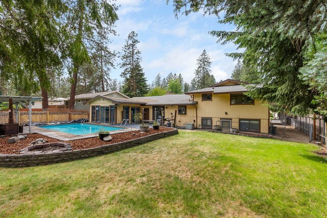 10818 N Humboldt Dr, Spokane, WA 99218 - rear view of property with a fenced backyard and a patio