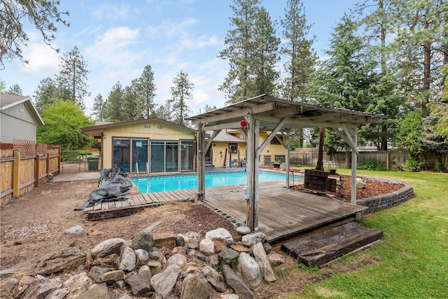 10818 N Humboldt Dr, Spokane, WA 99218 - view of swimming pool featuring a fenced backyard and a deck