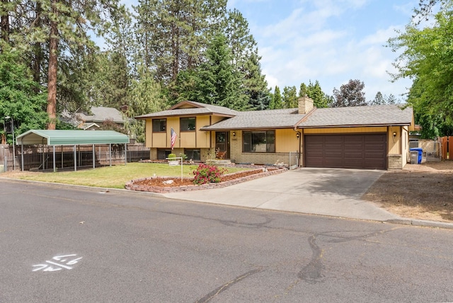 10818 N Humboldt Dr, Spokane, WA 99218 - tri-level home with brick siding, a chimney, an attached garage, driveway, and roof with shingles