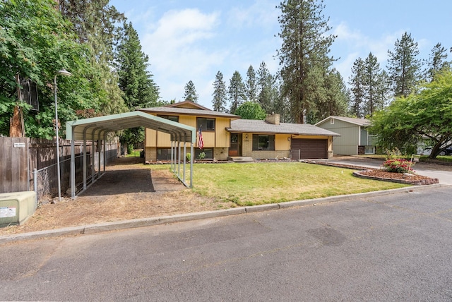 10818 N Humboldt Dr, Spokane, WA 99218 - view of front of property with brick siding, driveway, a carport, a chimney, and an attached garage