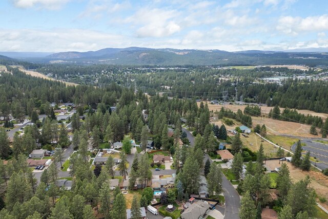 10818 N Humboldt Dr, Spokane, WA 99218 - aerial view of property and surrounding area with mountains and nearby suburban area