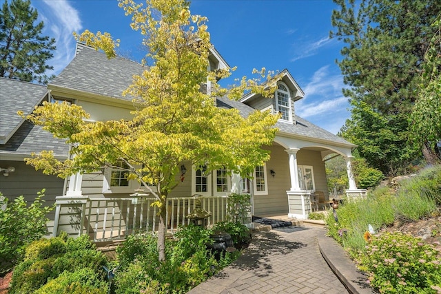 2008 S Zephyr Rd, Liberty Lake, WA 99019 - view of front facade with covered porch and roof with shingles