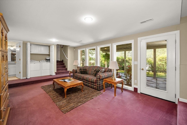 2008 S Zephyr Rd, Liberty Lake, WA 99019 - living area with dark carpet, washer and dryer, and stairs