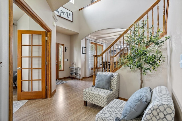 2813 S Steen Ln, Greenacres, WA 99016 - entryway featuring arched walkways, wood finished floors, and stairs